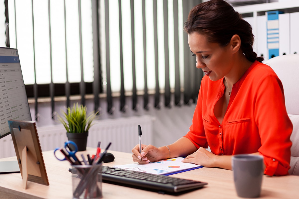 Direct Sales Representative Working On A Quote For A Client